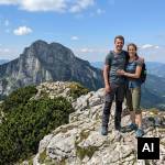 Couple posing on mountain peak